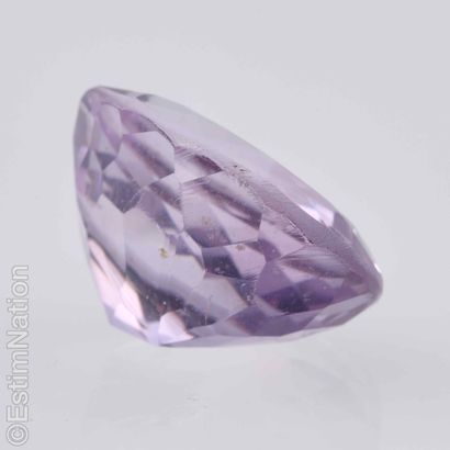 AMETHYST ON PAPER
Faceted oval-cut amethyst....