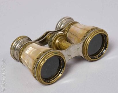 DISPLAY PIECE 
A pair of brass theater binoculars...