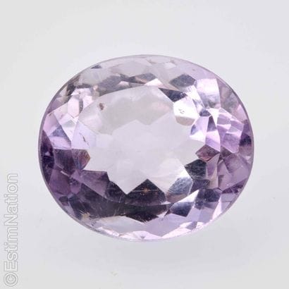 AMETHYST ON PAPER
Faceted oval-cut amethyst....
