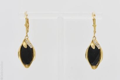 PAIR OF YELLOW GOLD EARRINGS
Pair of 18K...