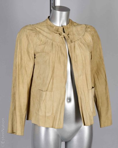 TOD'S, MARC JACOBS
VESTE en agneau velours...