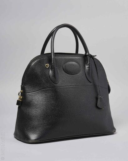 LANCEL
SAC dôme en cuir strié noir, cadenas,...