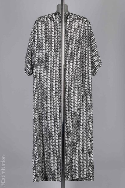 CHRISTIAN DIOR VINTAGE
ROBE DE PLAGE agrémentée...