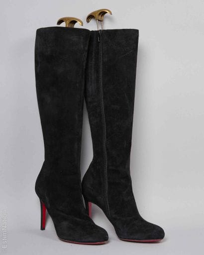 CHRISTIAN LOUBOUTIN
PAIRE DE BOTTES en peau...