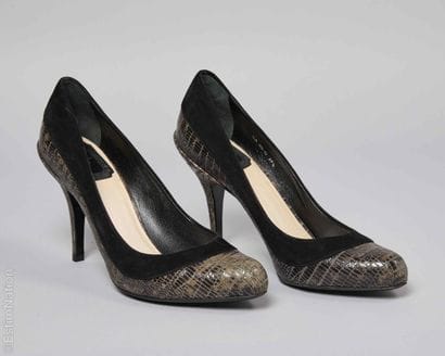 CHRISTIAN DIOR
PAIRE D'ESCARPINS en peau...
