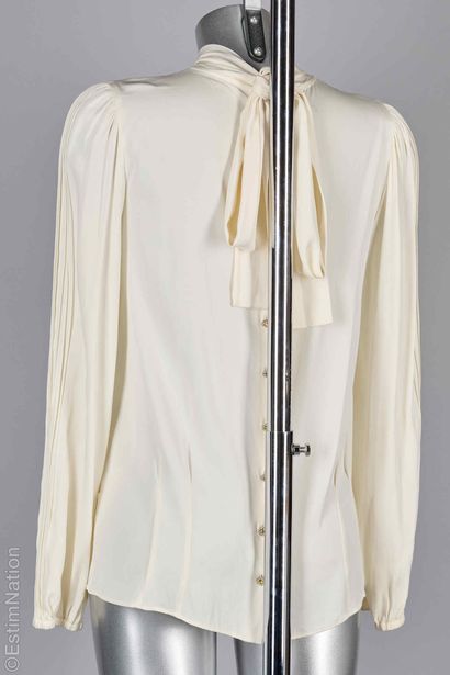 DOLCE & GABBANA
BLOUSE en soie blanc cassé,...