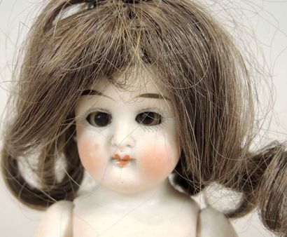 POUPEE PORCELAINE
Mignonette en porcelaine...