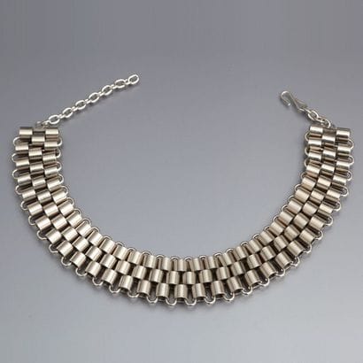 Woloch - (années 1970)
Collier de chien moderniste...