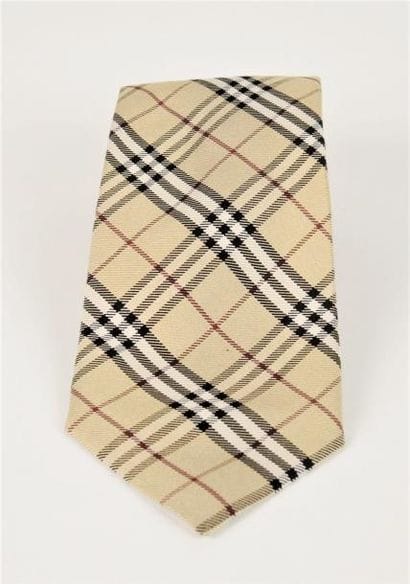 BURBERRY
CRAVATE en soie façonnée tartan...