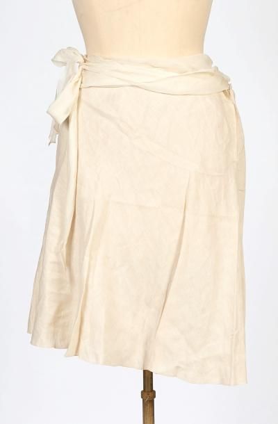 TARA JARMON, CERRUTI 1881
TOP en coton beige...