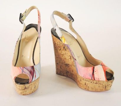 Christian LOUBOUTIN
PAIRE DE SANDALES à semelle...