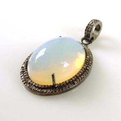 PENDENTIF OPALE DIAMANTS
Pendentif en argent...