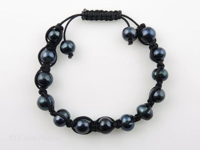 Bracelet shamballa composé de 15 perles d'eau...