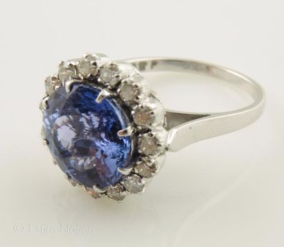 BAGUE TANZANITE
Bague marguerite en or gris...