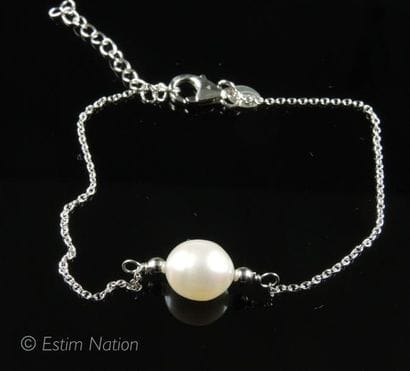 BRACELET PERLE
Bracelet en argent 925/°°...