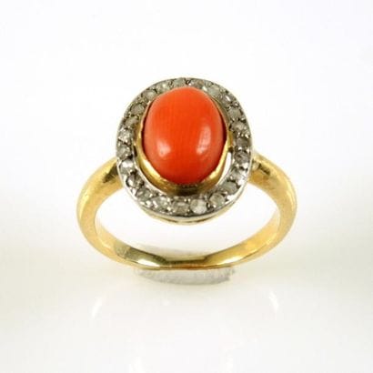 BAGUE VERS 1900 EN OR ET CORAIL
Bague en...