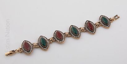 BRACELET ANNEES 1950
Bracelet en métal doré...