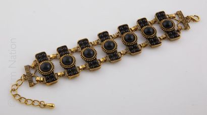 BRACELET ANNEES 1950
Bracelet en métal doré...