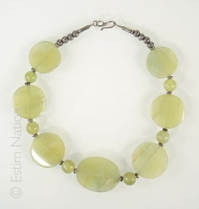 COLLIER SERPENTINE
Collier alternant disques...