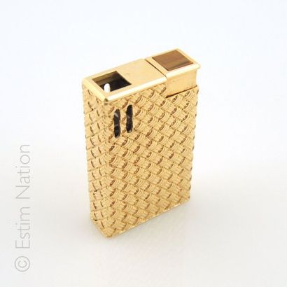 FRED
Briquet à gaz en or jaune 18K 750/°°...