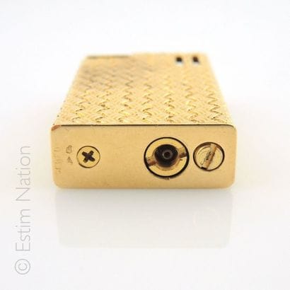FRED
Briquet à gaz en or jaune 18K 750/°°...