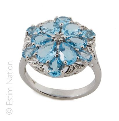 BAGUE TOPAZES
Bague en argent (925/°°) orné...
