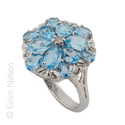 BAGUE TOPAZES
Bague en argent (925/°°) orné...