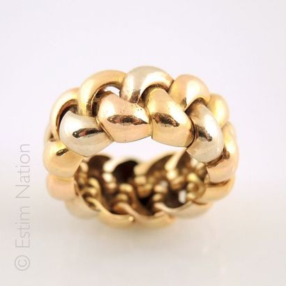 POIRAY
Bague trois ors 18K 750/°° monture...