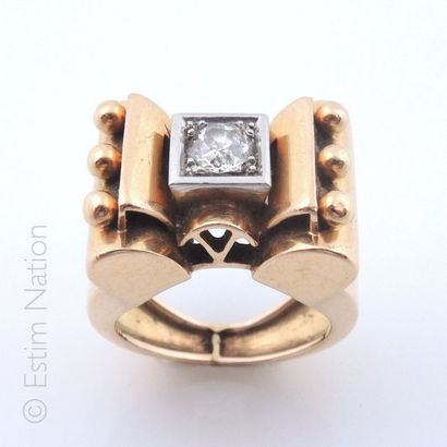 Bague tank en or jaune et or gris 18K (750/°°)...