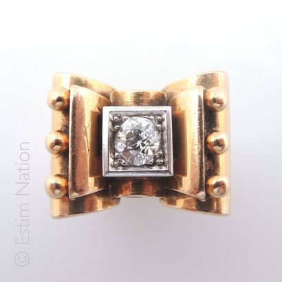 Bague tank en or jaune et or gris 18K (750/°°)...