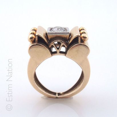 Bague tank en or jaune et or gris 18K (750/°°)...