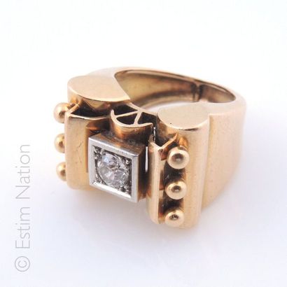 Bague tank en or jaune et or gris 18K (750/°°)...