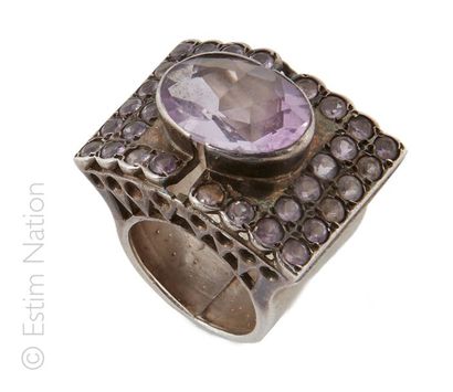 BAGUE AMETHYSTE ET QUARTZ
Importante bague...