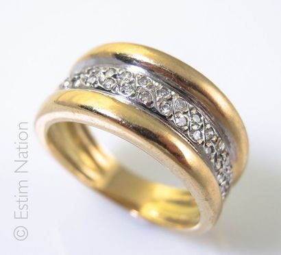 BAGUE BANDEAU
Bague en or jaune 18K (750/°°)...