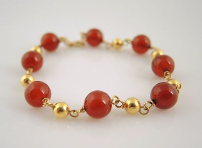 Bracelet en or jaune 18K 750/°° composé de...