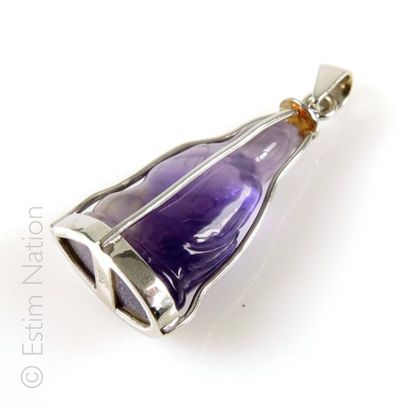 PENDENTIF ''BUDDHA''
Pendentif en or gris...
