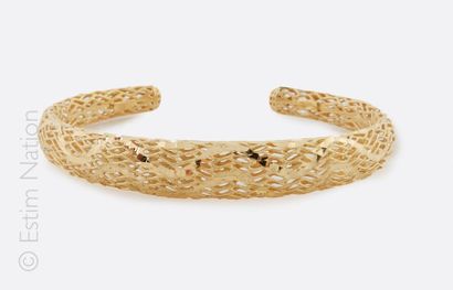 Bracelet jonc en argent (925/°°) doré à motifs...