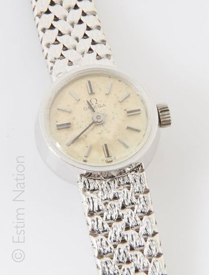 OMEGA
Montre de dame en or gris 18K (750/°°)...