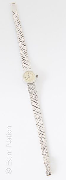 OMEGA
Montre de dame en or gris 18K (750/°°)...