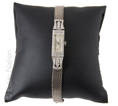 MONTRE DE DAME PLATINE DIAMANTS
Bracelet...