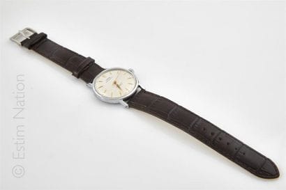 ORIS. Montre bracelet en acier. Cadran crème...
