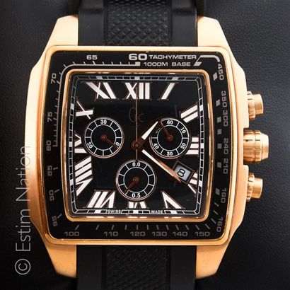 GUESS. Chrono en métal doré. Cadran noir...