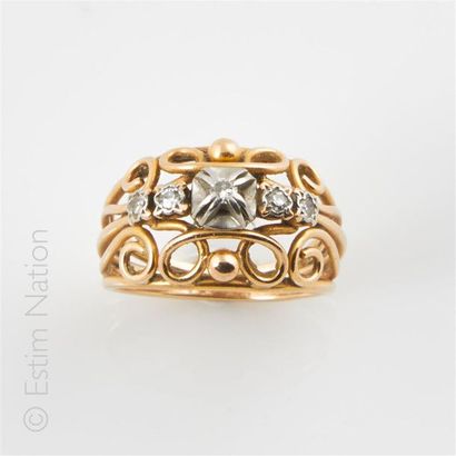 Bague en fils d'or 18K (750°/00) et platine...