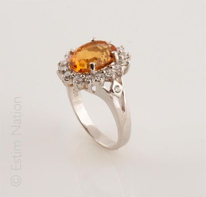 BAGUE CITRINE PIERRES BLANCHES 
Bague en...