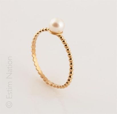 BAGUE PERLE
Bague en or jaune 9K (375/°°)...