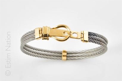 Bracelet composé de fils d'acier torsadé...