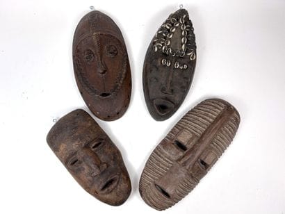 SET OF FOUR AFRICAN-STYLE MASKS
Wood with...