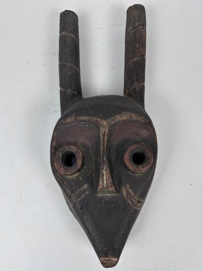 SET OF THREE AFRICAN-STYLE MASKS
Medium-hard...