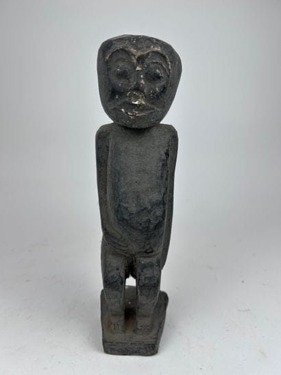 SET OF THREE AFRICAN-STYLE STATUETTES
Wood...