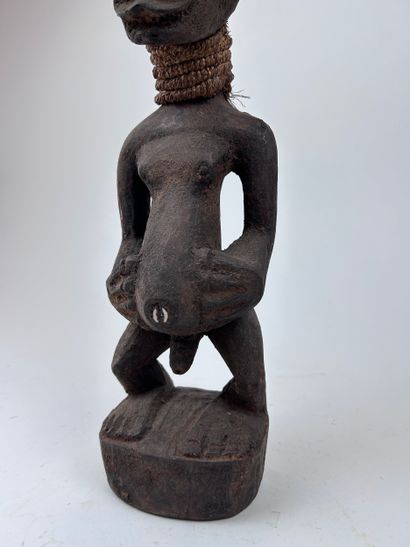 SET OF TWO AFRICAN-STYLE STATUETTES
Wood,...